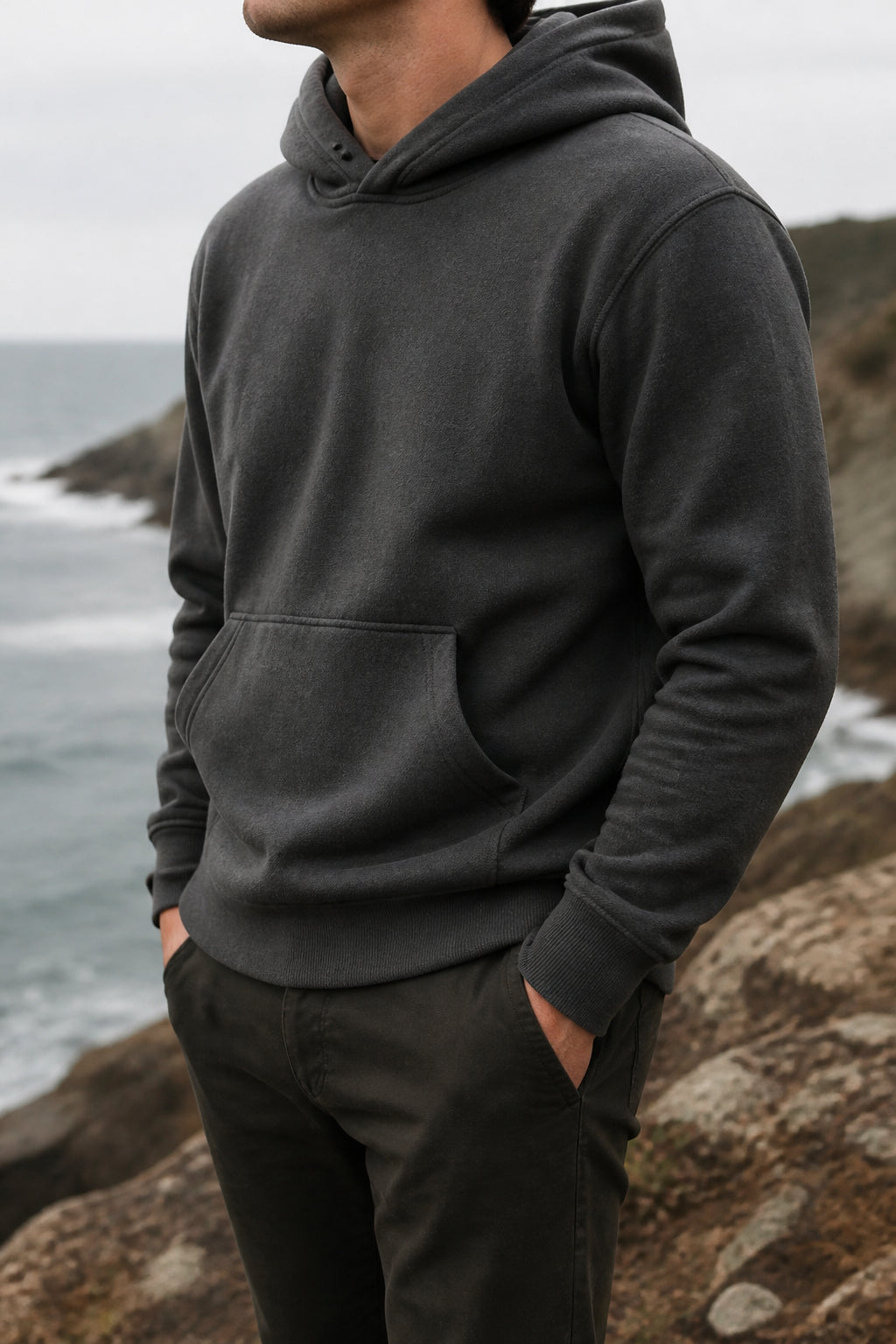 Soft coastal light on a fleece hoodie by the Atlantic shore